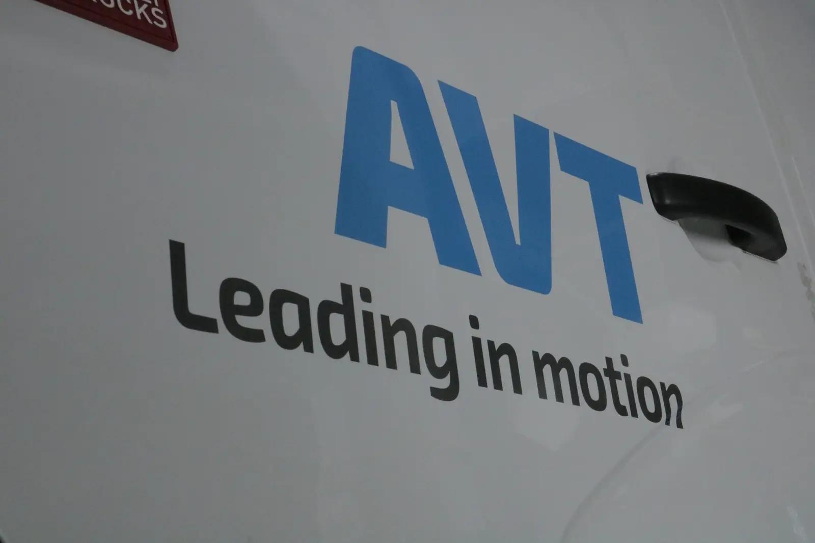 AVT lettering on the white cab door