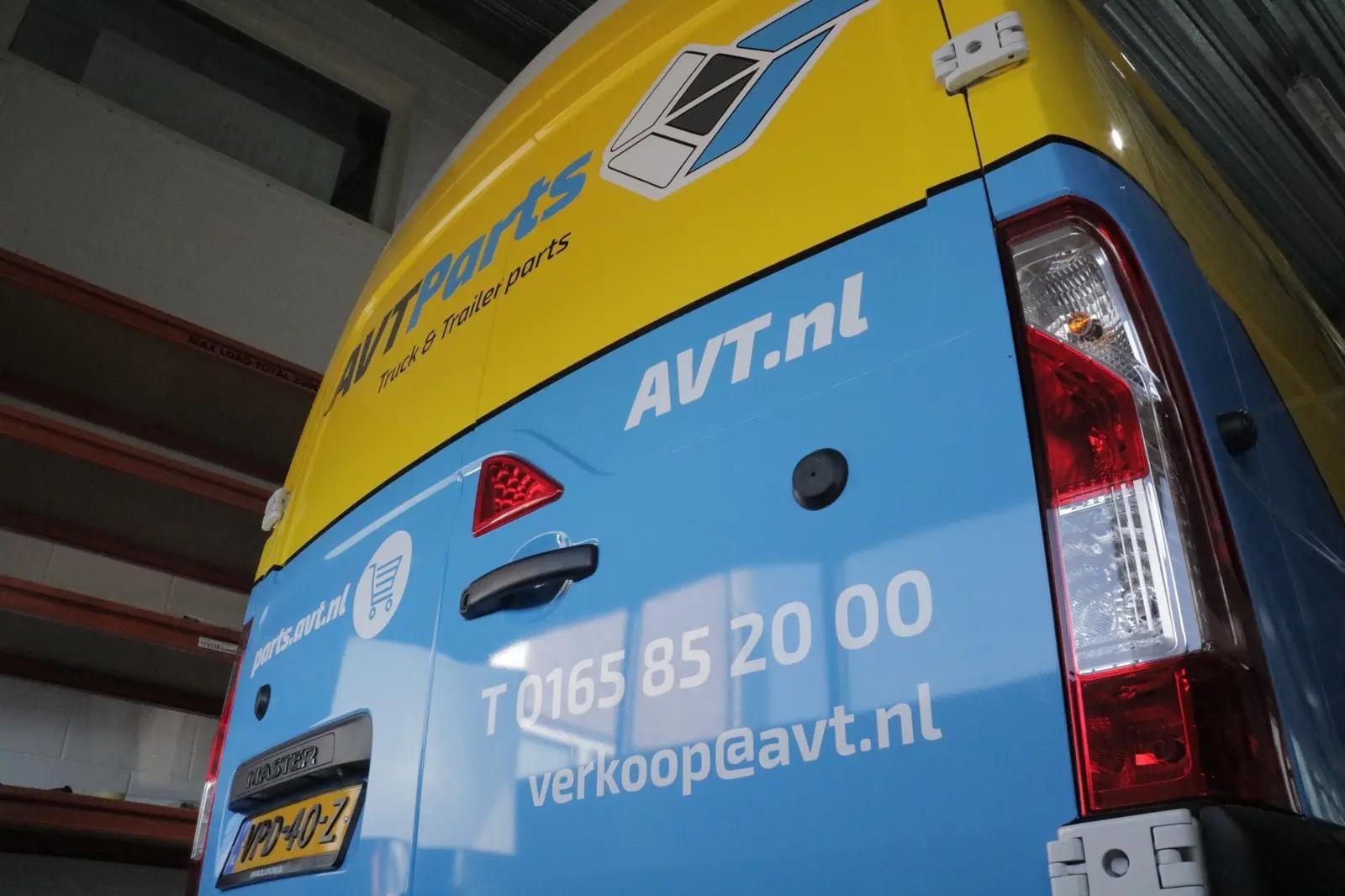 Yellow and light blue branding on the rear doors