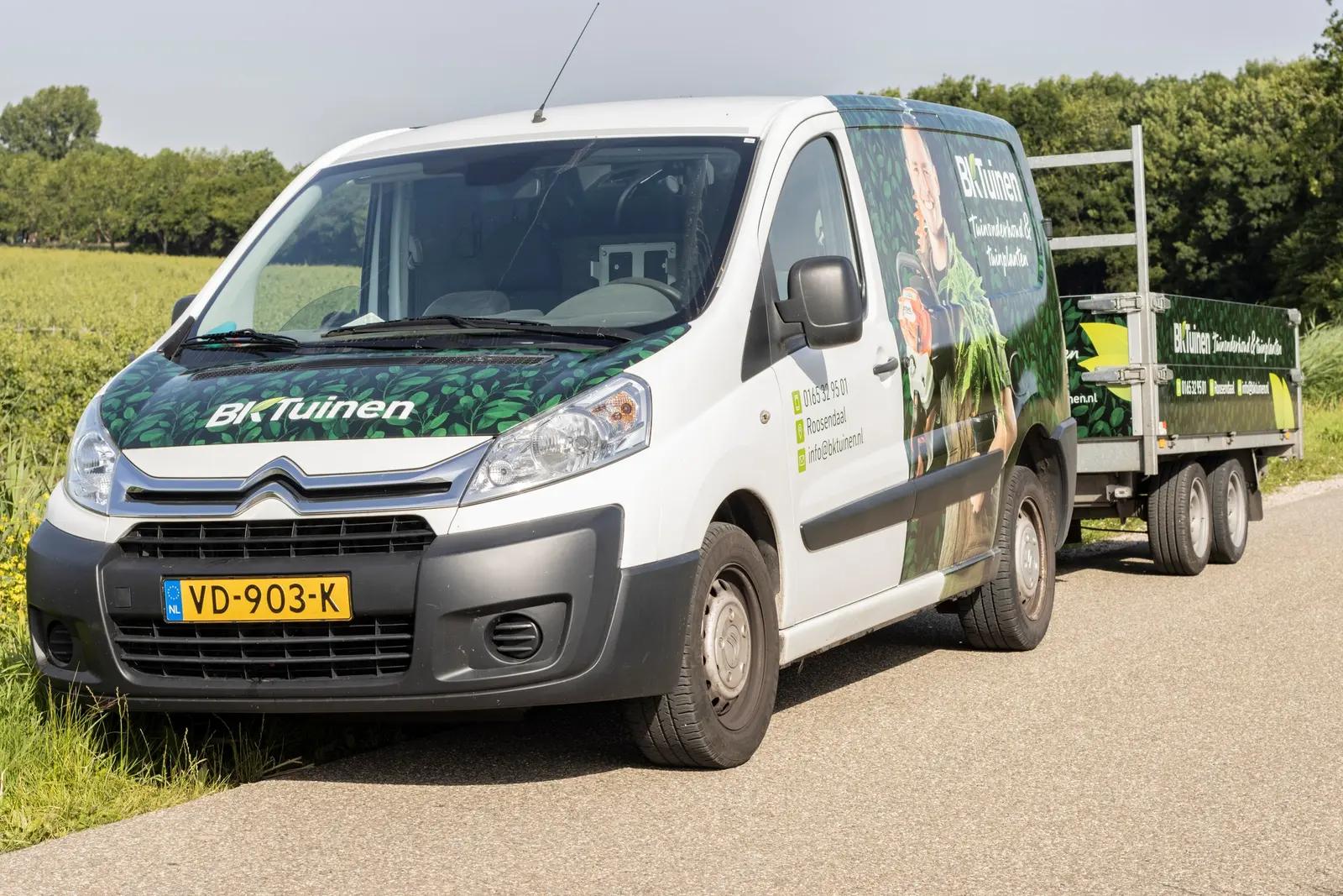 BK Tuinen van and trailer with green vehicle graphics