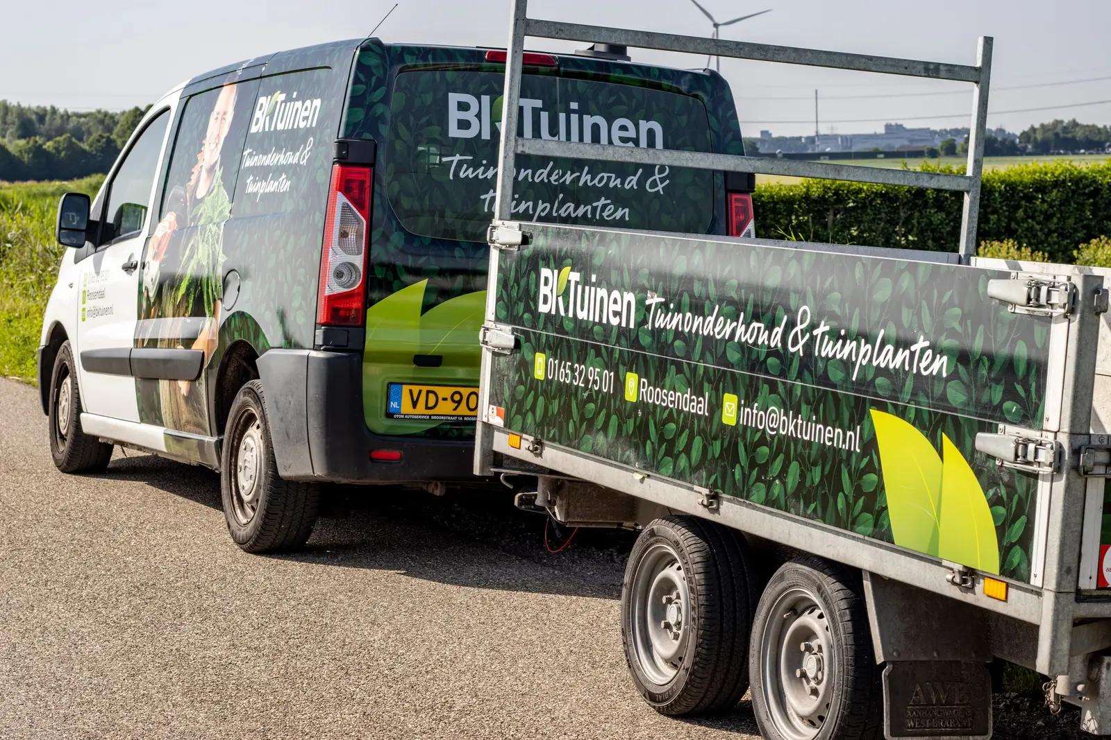 Rear of the branded van and trailer
