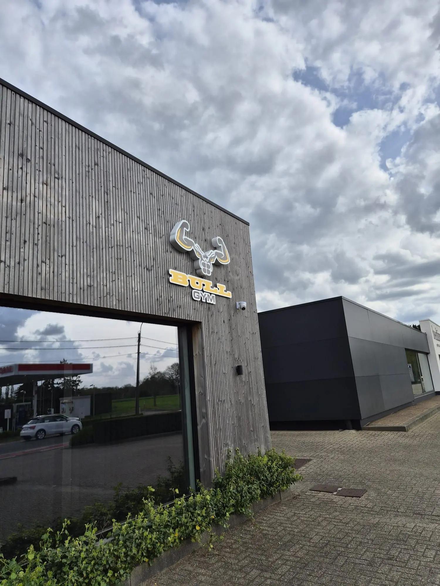 Bull Gym signage above the glazed entrance in Essen.