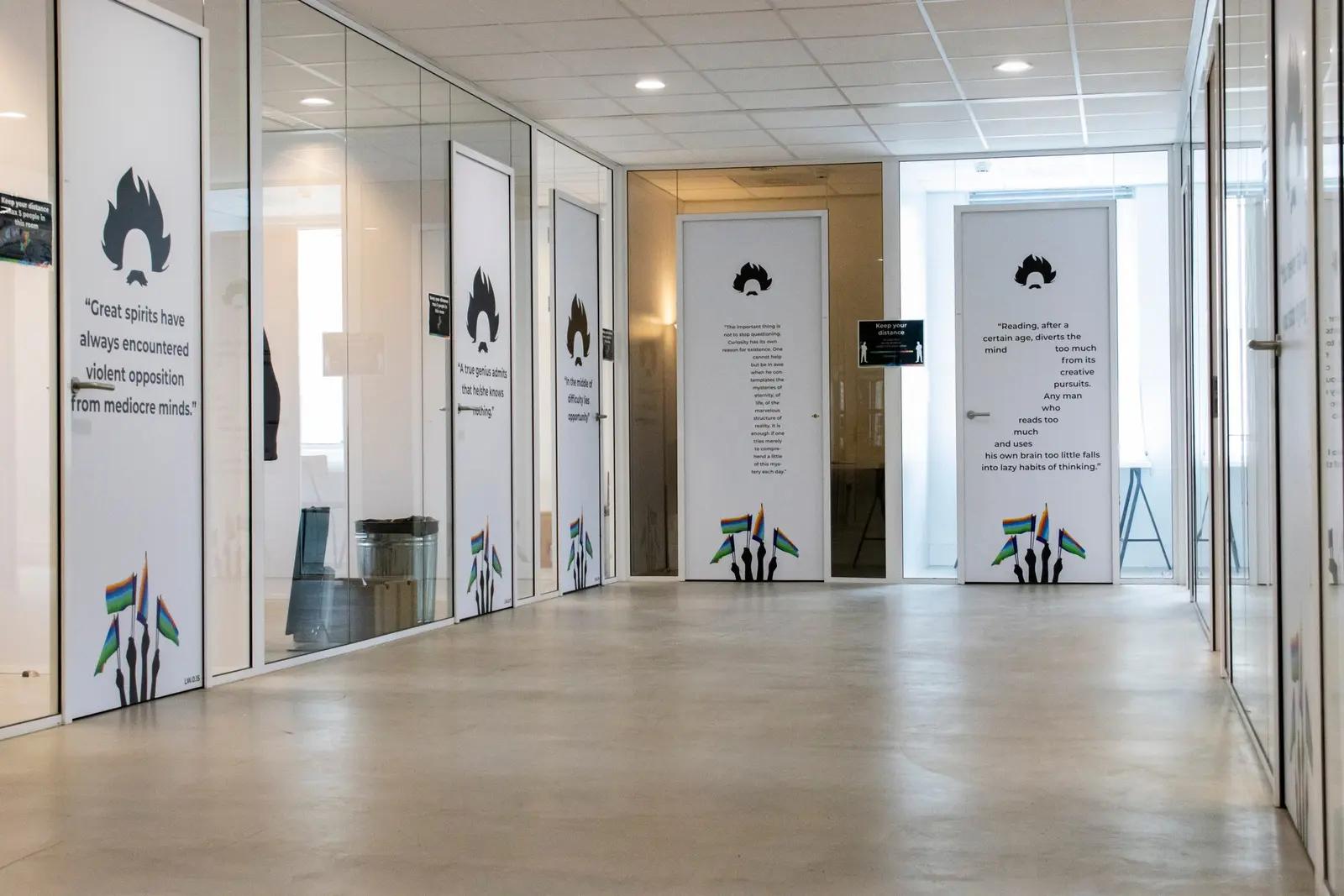 bunq corridor with printed doors and glass partitions
