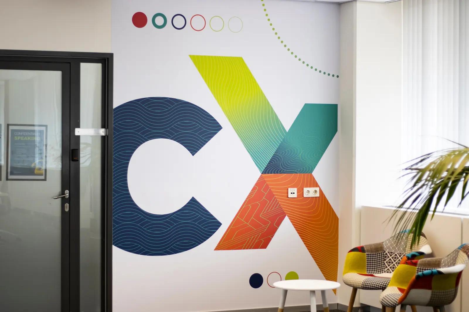 Kleurrijke Concentrix-wand met grafische merkelementen