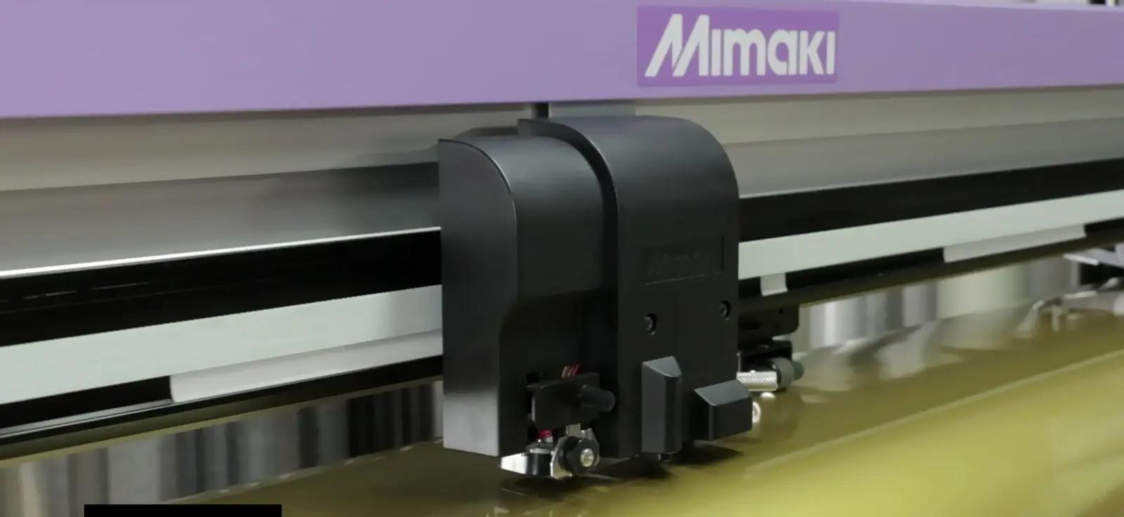 Contour cutting the printed vehicle graphics