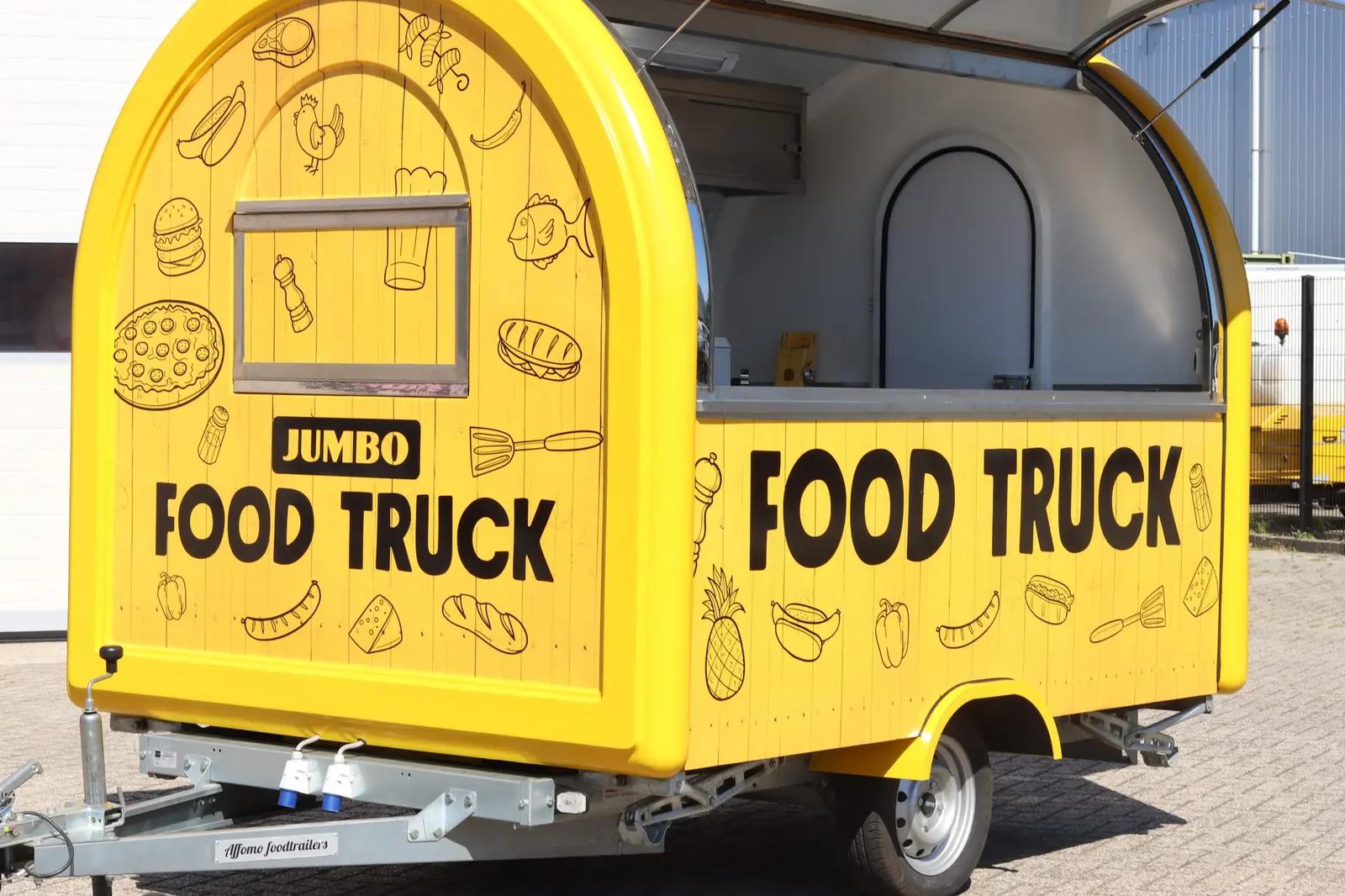 Angled view of the food trailer with its hatch open